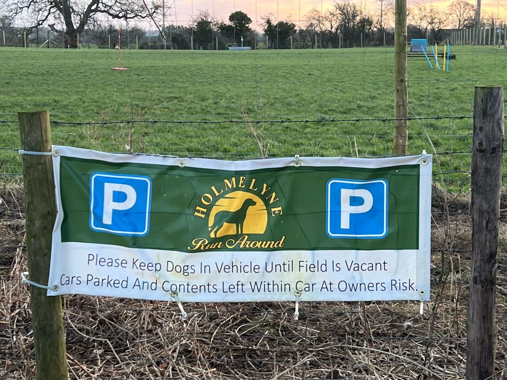 A photo of the parking sign at HolmeLyne Run Around